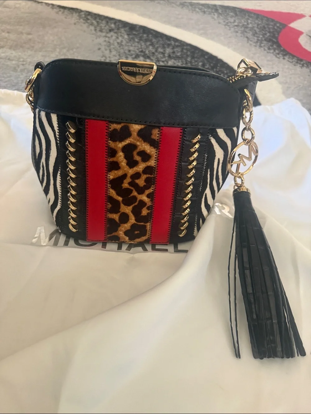 Michael Kors Black Zebra Leopard Crossbody with Red Stripes